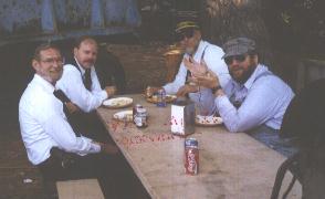 The guys gathering at the Shop Building