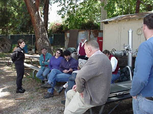 Sue talks to the associates about recent events