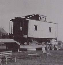 Caboose loaded on trailer