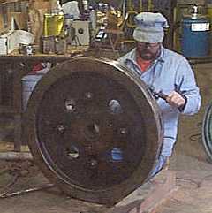 Greg Ramsey cleans M.177's Flywheel